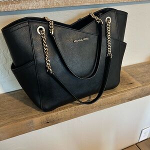 Michael Kors Jet Set large Saffiano leather black large tote gold tone hardware